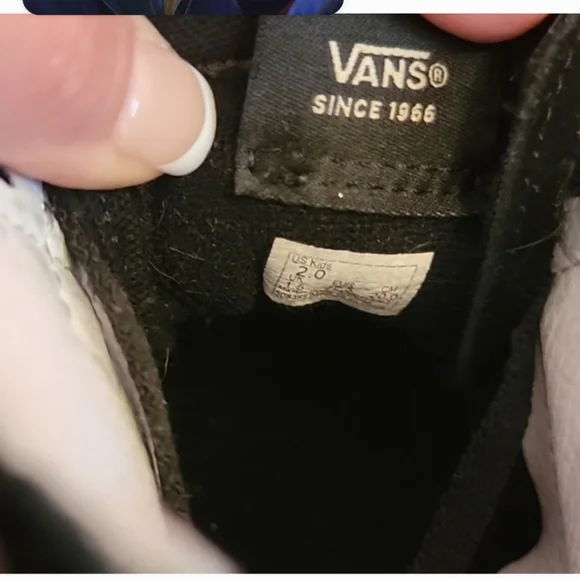 Kids gold and blackVan's size 2